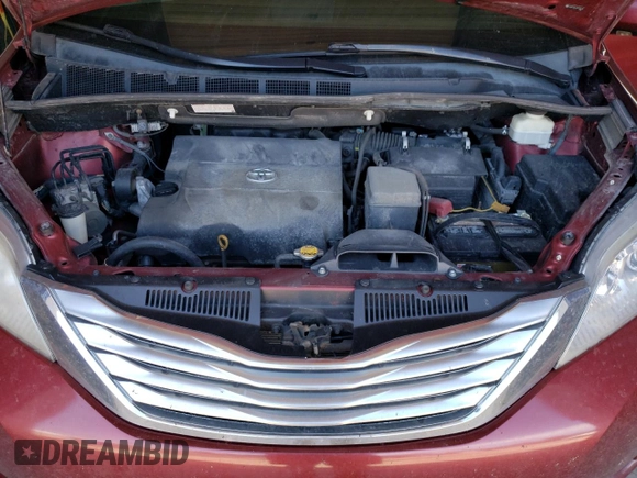 2012 Toyota Sienna XLE AAS with VIN 5TDYK3DC5CS187675, listed as a Copart auction lot 55211635 with 328,972 mi miles and Clean Title. Bid and sale history available at DreamBid. Image 12.
