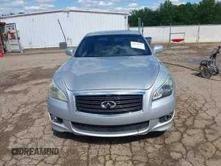 2013 Infiniti M with VIN JN1BY1AP0DM513527, listed as a IAAI auction lot 42170513 with 194,908 mi miles and . Bid and sale history available at DreamBid. Image 13.