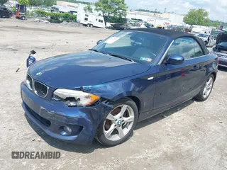 2012 BMW 1 Series 128i with VIN WBAUN1C56CVR00132, listed as a IAAI auction lot 42387792 with 122,741 mi miles and . Bid and sale history available at DreamBid. Image 17.