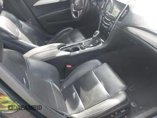 2014 Cadillac ATS Luxury AWD z VIN 1G6AH5RX1E0164796, wystawiony jako IAAI lot #42211010 z przebiegiem 167 079 mil mil oraz . Historia ofert i sprzedaży dostępna na DreamBid. Obrazek 5.
