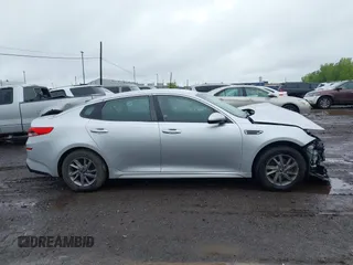2020 Kia Optima LX z VIN 5XXGT4L37LG400711, wystawiony jako IAAI lot #42333957 z przebiegiem 30 000 mil mil oraz . Historia ofert i sprzedaży dostępna na DreamBid. Obrazek 13.