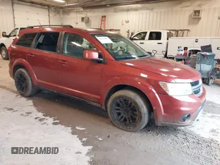 2013 Dodge Journey SXT with VIN 3C4PDCBG1DT674911, listed as a IAAI auction lot 41713407 with 153,757 mi miles and . Bid and sale history available at DreamBid. Image 1.