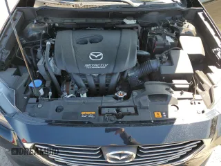 2016 Mazda CX-3 Grand Touring z VIN JM1DKBD79G0124504, wystawiony jako Copart lot #53663945 z przebiegiem 94 253 mil mil oraz Szkoda całkowita • Salvage title. Historia ofert i sprzedaży dostępna na DreamBid. Obrazek 11.