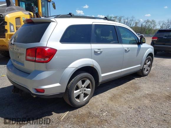 2011 Dodge Journey Mainstreet with VIN 3D4PH1FG4BT562414, listed as a IAAI auction lot 42122747 with 132,488 mi miles and . Bid and sale history available at DreamBid. Image 4.