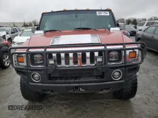 2003 Hummer H2 with VIN 5GRGN23U33H136931, listed as a Copart auction lot 80671794 with 127,137 mi miles and Salvage Title. Bid and sale history available at carsss.com. Image 5.