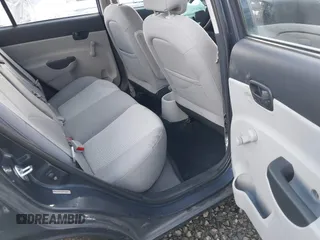 2008 Hyundai Accent GLS with VIN KMHCN46C58U207099, listed as a IAAI auction lot 41788937 with 99,812 mi miles. Bid and sale history available at carsss.com. Image 8.