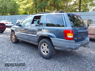 2001 Jeep Grand Cherokee Laredo with VIN 1J4GW48SX1C585867, listed as a IAAI auction lot 42793657 with 197,167 mi miles and . Bid and sale history available at DreamBid. Image 3.