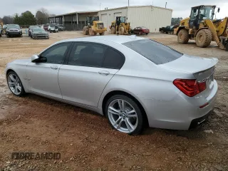 2012 BMW 7 Series 740Li with VIN WBAKB4C50CC576043, listed as a Copart auction lot 42060065 with 142,017 mi miles and Salvage Title. Bid and sale history available at carsss.com. Image 2.