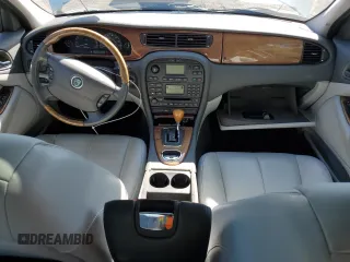 2003 Jaguar S-Type z VIN SAJEA01U53HM73131, wystawiony jako Copart lot #73430914 z przebiegiem 72 730 mil mil oraz Szkody całkowita. Historia ofert i sprzedaży dostępna na DreamBid. Obrazek 8.