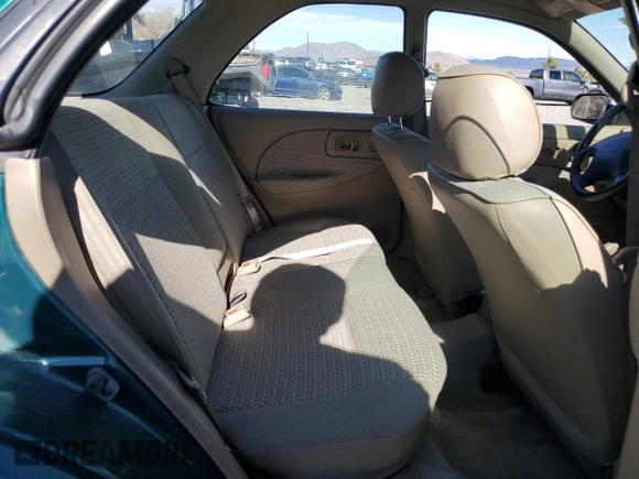 1997 Subaru Impreza L with VIN JF1GF4352VG821519, listed as a Copart auction lot 76420034 with 57,600 mi miles and Clean title. Bid and sale history available at DreamBid. Image 11.