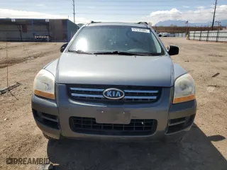 2007 Kia Sportage LX with VIN KNDJF724277378611, listed as a Copart auction lot 51516305 with 150,856 mi miles and Salvage Title. Bid and sale history available at carsss.com. Image 5.