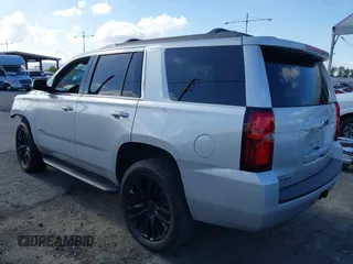 2020 Chevrolet Tahoe LS with VIN 1GNSCAKC2LR227856, listed as a IAAI auction lot 42246510 with 55,132 mi miles and . Bid and sale history available at DreamBid. Image 3.