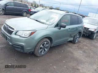 2017 Subaru Forester with VIN JF2SJABC3HH442661, listed as a IAAI auction lot 42136851 with 89,791 mi miles and . Bid and sale history available at DreamBid. Image 2.