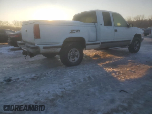 1995 GMC Sierra 1500 z VIN 2GTEK19KXS1504198, wystawiony jako Copart lot #87508215 z przebiegiem 3 210 847 mil mil oraz Szkody całkowita. Historia ofert i sprzedaży dostępna na DreamBid. Obrazek 3.
