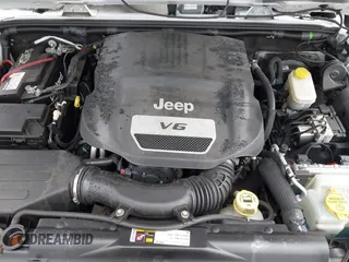 2015 Jeep Wrangler Unlimited Sahara with VIN 1C4BJWEG5FL518191, listed as a IAAI auction lot 41914581 with 107,433 mi miles. Bid and sale history available at carsss.com. Image 10.