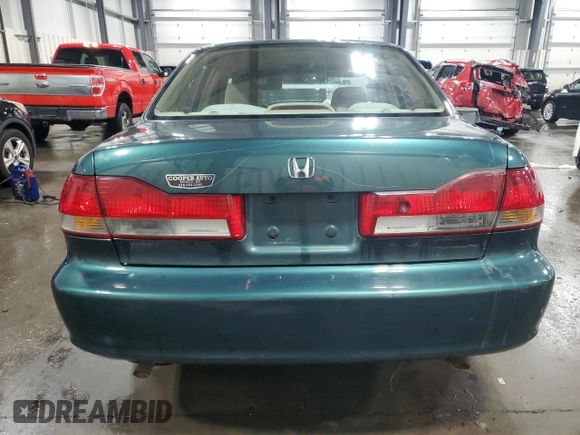 2002 Honda Accord LX z VIN 1HGCG16442A043585, wystawiony jako Copart lot #74481474 z przebiegiem 223 446 mil mil oraz Szkoda całkowita • Salvage title. Historia ofert i sprzedaży dostępna na DreamBid. Obrazek 6.