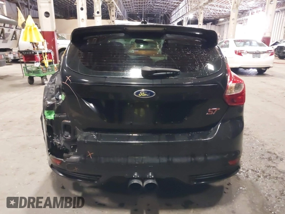 2014 Ford Focus ST with VIN 1FADP3L96EL355713, listed as a IAAI auction lot 41572939 with 102,838 mi miles and . Bid and sale history available at carsss.com. Image 17.