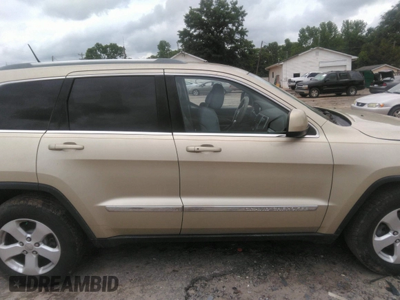 2012 Jeep Grand Cherokee Laredo with VIN 1C4RJEAGXCC157616, listed as a IAAI auction lot 42156539 with 301,661 mi miles. Bid and sale history available at carsss.com. Image 13.