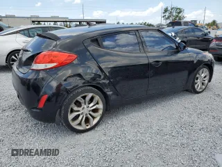 2013 Hyundai Veloster w/Black Int z VIN KMHTC6ADXDU157196, wystawiony jako Copart lot #58091015 z przebiegiem 136 201 mil mil oraz Szkoda całkowita • Salvage title. Historia ofert i sprzedaży dostępna na DreamBid. Obrazek 3.