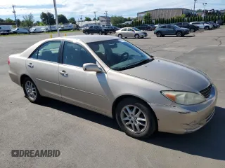 2004 Toyota Camry LE with VIN 4T1BE32K84U929163, listed as a Copart auction lot 65193485 with 245,734 mi miles and Clean title. Bid and sale history available at DreamBid. Image 4.