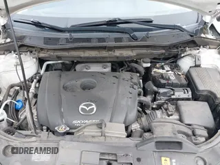 2016 Mazda CX-5 Sport with VIN JM3KE4BY7G0764563, listed as a IAAI auction lot 42279993 with 128,950 mi miles and . Bid and sale history available at DreamBid. Image 10.