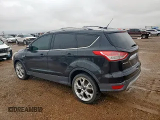 2014 Ford Escape Titanium с VIN 1FMCU0J90EUA04690, выставлен на аукционе Copart как лот 58421735 с пробегом 200 743 миль миль и Чистый • Clean title. История ставок и продаж доступна на DreamBid. Изображение 2.