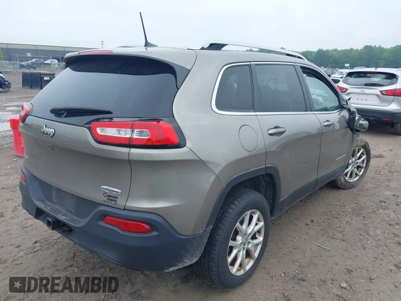 2017 Jeep Cherokee Latitude with VIN 1C4PJMCB3HW657318, listed as a IAAI auction lot 42429044 with 133,335 mi miles and . Bid and sale history available at DreamBid. Image 4.