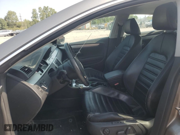 2009 Volkswagen CC Luxury with VIN WVWHL73C19E514531, listed as a Copart auction lot 71124304 with 120,483 mi miles and Salvage Title. Bid and sale history available at DreamBid. Image 7.