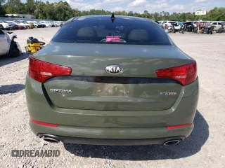 2013 Kia Optima EX с VIN 5XXGN4A77DG108218, выставлен на аукционе Copart как лот 57728815 с пробегом 162 475 миль миль и Списание • Salvage title. История ставок и продаж доступна на DreamBid. Изображение 6.