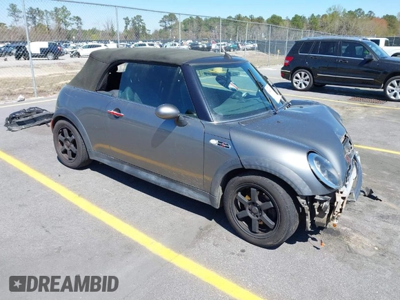 2005 MINI Convertible S with VIN WMWRH33545TF85051, listed as a IAAI auction lot 41843147 with 109,656 mi miles and . Bid and sale history available at DreamBid. Image 1.