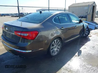 2014 Kia Cadenza Premium with VIN KNALN4D78E5151222, listed as a IAAI auction lot 41419842 with 137,710 mi miles. Bid and sale history available at carsss.com. Image 4.