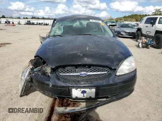 2000 Ford Taurus SE with VIN 1FAFP53U9YG285971, listed as a Copart auction lot 78138984 with 182,135 mi miles and Salvage Title. Bid and sale history available at DreamBid. Image 5.
