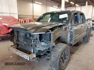 2016 Toyota Tacoma SR with VIN 3TMCZ5AN2GM041649, listed as a IAAI auction lot 41758859 with 139,558 mi miles and . Bid and sale history available at DreamBid. Image 6.