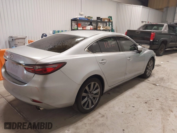 2018 Mazda 6 Touring with VIN JM1GL1VM8J1312778, listed as a IAAI auction lot 41387098 with 129,611 mi miles and . Bid and sale history available at carsss.com. Image 4.