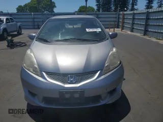 2009 Honda Fit Sport z VIN JHMGE88459S054996, wystawiony jako Copart lot #54799705 z przebiegiem 69 642 mil mil oraz Szkody całkowita. Historia ofert i sprzedaży dostępna na DreamBid. Obrazek 5.