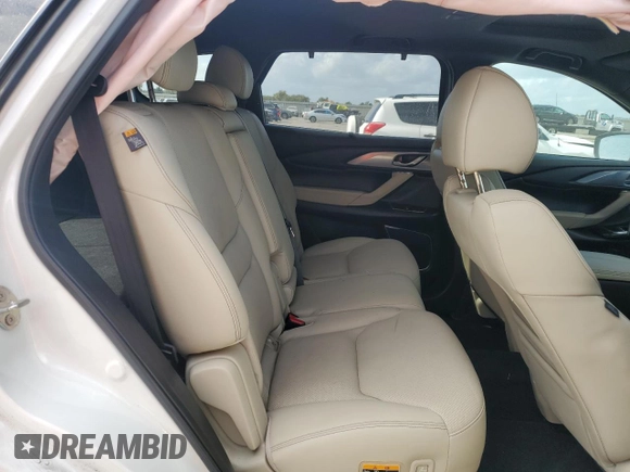 2021 Mazda CX-9 Grand Touring with VIN JM3TCADY2M0519977, listed as a Copart auction lot 76137724 with 31,306 mi miles and Salvage title. Bid and sale history available at DreamBid. Image 11.