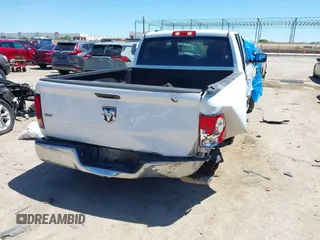 2021 Ram 1500 SLT with VIN 1C6RR6TTXMS517345, listed as a IAAI auction lot 42314123 with 107,307 mi miles and . Bid and sale history available at DreamBid. Image 4.