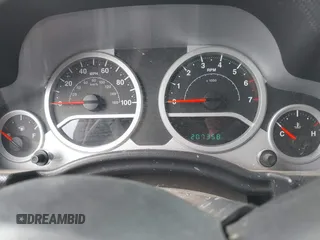 2007 Jeep Wrangler Unlimited Sahara with VIN 1J4GA59177L162022, listed as a IAAI auction lot 41887599 with 207,358 mi miles and . Bid and sale history available at DreamBid. Image 7.
