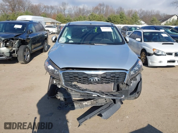 2020 Kia Sorento LX with VIN 5XYPG4A31LG638850, listed as a IAAI auction lot 40982683 with 143,149 mi miles. Bid and sale history available at carsss.com. Image 13.