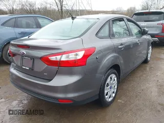 2012 Ford Focus SE with VIN 1FAHP3F26CL220986, listed as a IAAI auction lot 41719127 with 127,050 mi miles and . Bid and sale history available at DreamBid. Image 4.