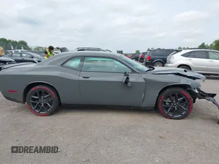 2023 Dodge Challenger SXT с VIN 2C3CDZAG2PH695092, выставлен на аукционе IAAI как лот 42505262 с пробегом 13 187 миль миль и . История ставок и продаж доступна на DreamBid. Изображение 14.