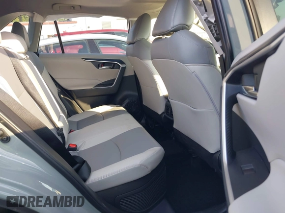 2021 Toyota RAV4 Hybrid LE with VIN JTMB6RFV3MD038562, listed as a IAAI auction lot 42576852 with 27,463 mi miles and . Bid and sale history available at DreamBid. Image 8.