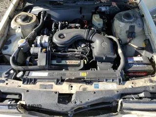 1990 Cadillac DeVille z VIN 1G6CD5333L4256377, wystawiony jako Copart lot #42613635 z przebiegiem 136 754 mil mil oraz Szkoda całkowita • Salvage title. Historia ofert i sprzedaży dostępna na DreamBid. Obrazek 11.