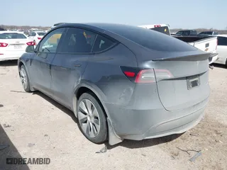 2023 Tesla Model Y Long Range with VIN 7SAYGDEE5PA035722, listed as a IAAI auction lot 41726067 with 34,357 mi miles. Bid and sale history available at carsss.com. Image 3.