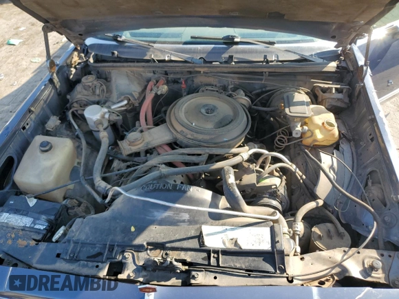 1984 Chevrolet El Camino z VIN 1GCCW80H1ER215342, wystawiony jako Copart lot #83956964 z przebiegiem 14 096 mil mil oraz Szkoda całkowita • Salvage title. Historia ofert i sprzedaży dostępna na DreamBid. Obrazek 11.