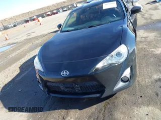 2014 Scion FR-S z VIN JF1ZNAA18E9700718, wystawiony jako IAAI lot #40958319 z przebiegiem 104 010 mil mil oraz . Historia ofert i sprzedaży dostępna na DreamBid. Obrazek 13.