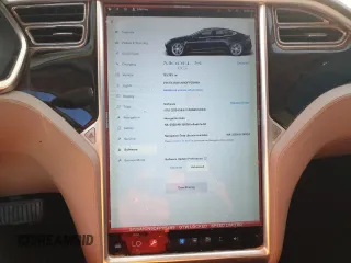 2013 Tesla Model S with VIN 5YJSA1CN9DFP05499, listed as a Copart auction lot 80078144 with 133,763 mi miles and Salvage Title. Bid and sale history available at carsss.com. Image 9.