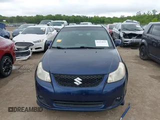 2009 Suzuki SX4 Sport FWD z VIN JS2YC414196200260, wystawiony jako IAAI lot #42354835 z przebiegiem 175 909 mil mil oraz . Historia ofert i sprzedaży dostępna na DreamBid. Obrazek 12.