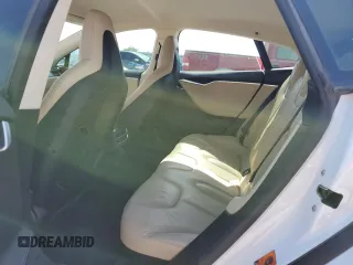 2014 Tesla Model S 60 с VIN 5YJSA1H16EFP45983, выставлен на аукционе Copart как лот 52256635 с пробегом 159 948 миль миль и Списание • Salvage title. История ставок и продаж доступна на DreamBid. Изображение 10.