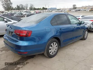 2016 Volkswagen Jetta Sedan 1.4T S with VIN 3VW267AJ3GM306265, listed as a IAAI auction lot 41880787 with 42,253 mi miles. Bid and sale history available at carsss.com. Image 4.